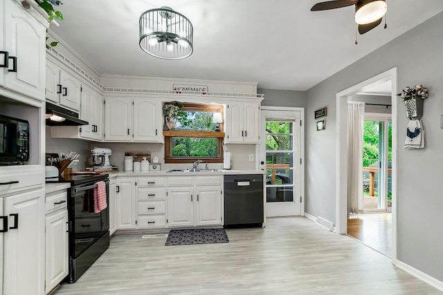 kitchen featuring light hardwood / wood-style flooring, sink, black appliances, white cabinetry, and ceiling fan