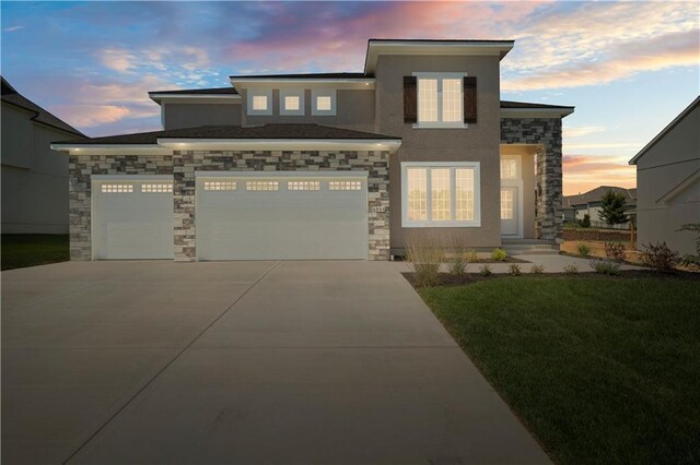 view of front of property with a lawn