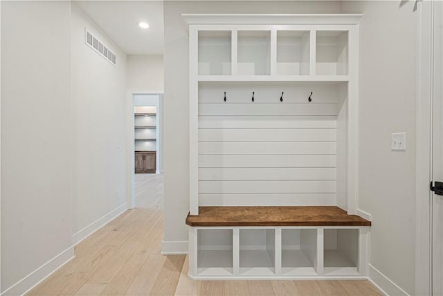 mudroom featuring wood-type flooring