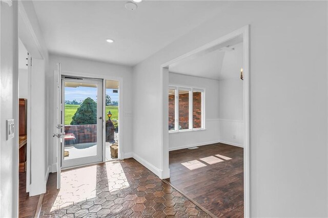 22750 Switzer Rd, Bucyrus, KS 66013 - entrance foyer with baseboards, dark wood-type flooring, and recessed lighting