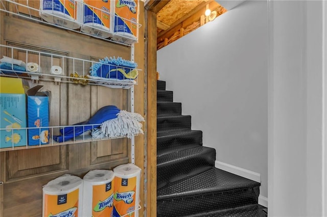 22750 Switzer Rd, Bucyrus, KS 66013 - staircase featuring baseboards