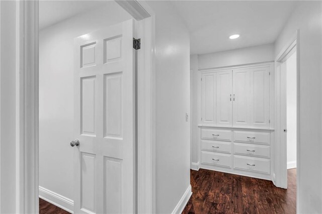 22750 Switzer Rd, Bucyrus, KS 66013 - hallway featuring baseboards, dark wood-style flooring, and recessed lighting