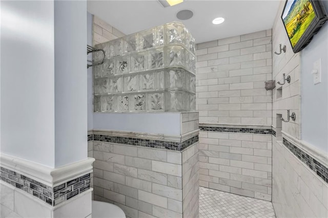 22750 Switzer Rd, Bucyrus, KS 66013 - full bath with a walk in shower, toilet, and tile walls
