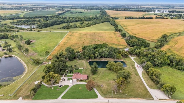 22750 Switzer Rd, Bucyrus, KS 66013 - drone / aerial view featuring a water view and a rural view