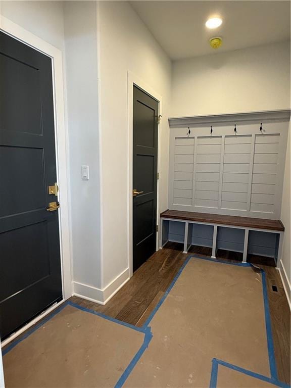 mudroom featuring recessed lighting and baseboards