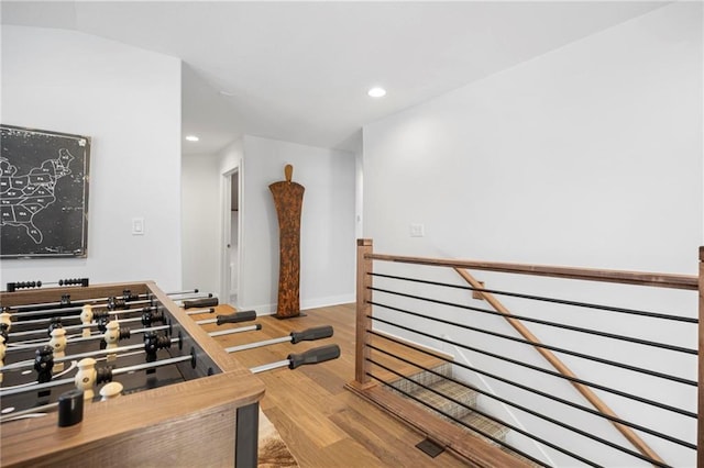 18452 Windsor St, Overland Park, KS 66085 - game room featuring baseboards, wood finished floors, and recessed lighting