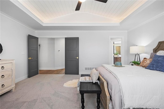 18452 Windsor St, Overland Park, KS 66085 - carpeted bedroom with a tray ceiling, visible vents, a ceiling fan, and baseboards