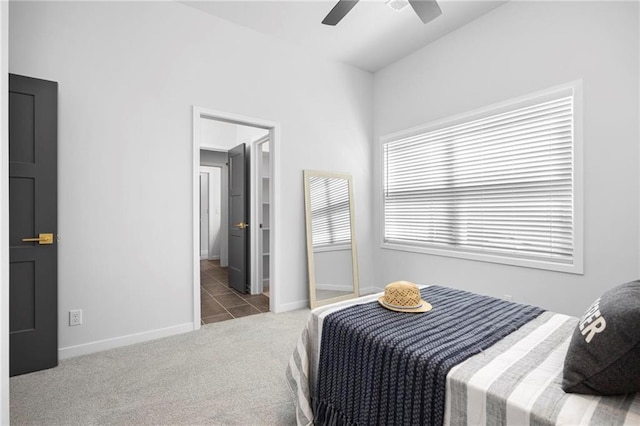18452 Windsor St, Overland Park, KS 66085 - carpeted bedroom with ceiling fan, baseboards, and tile patterned flooring