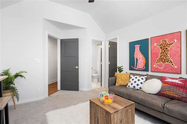 18452 Windsor St, Overland Park, KS 66085 - carpeted living area with lofted ceiling and baseboards