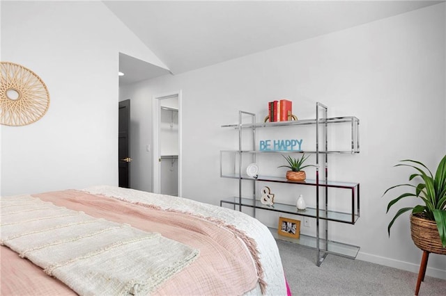18452 Windsor St, Overland Park, KS 66085 - carpeted bedroom featuring vaulted ceiling, baseboards, and a spacious closet