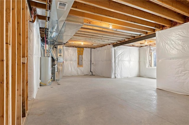 18452 Windsor St, Overland Park, KS 66085 - below grade area with water heater, electric panel, heating unit, and visible vents