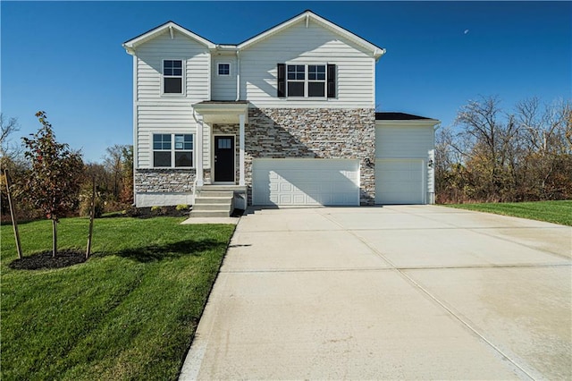 view of front facade featuring a front yard and a garage