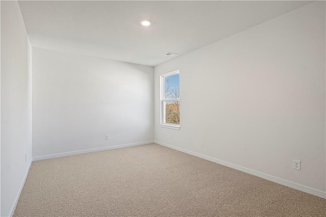 view of carpeted spare room