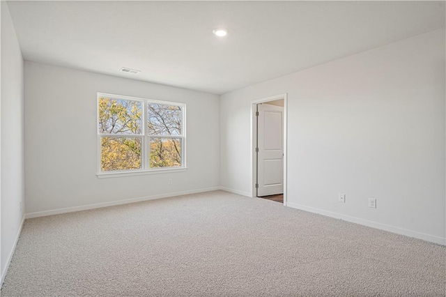 view of carpeted spare room