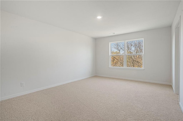 view of carpeted spare room