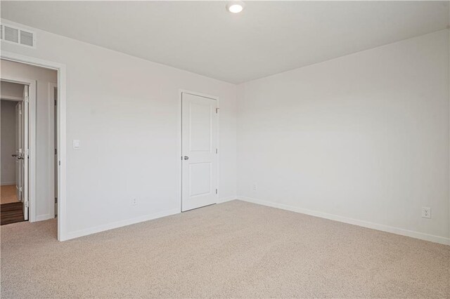 spare room with carpet flooring