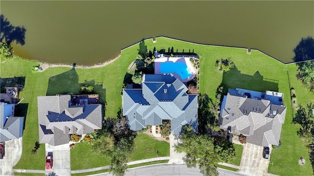 birds eye view of property with a residential view