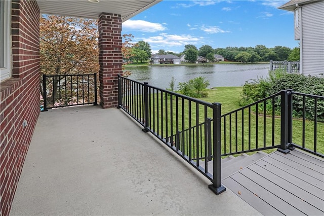 balcony featuring a water view