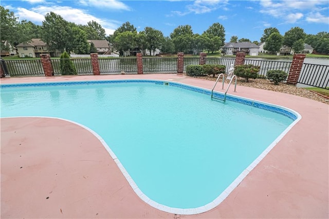 view of pool with fence and a fenced in pool