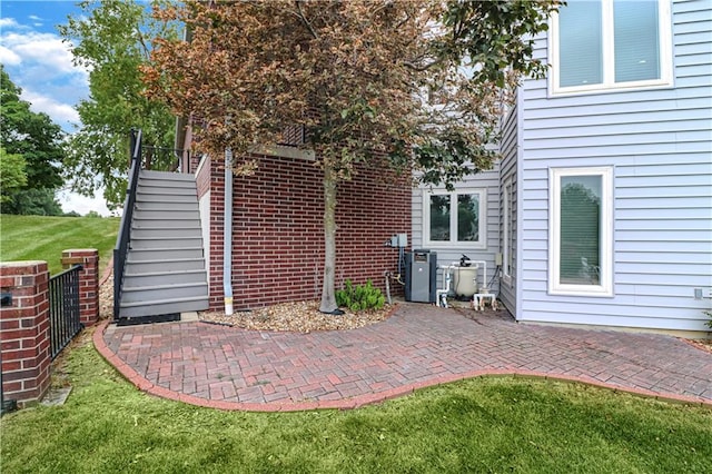 view of patio featuring stairway