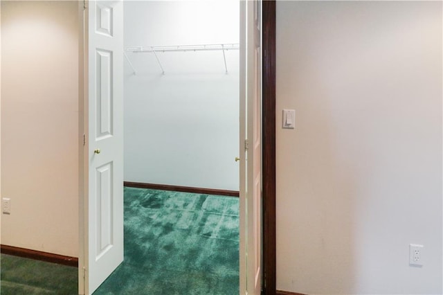 corridor with dark carpet