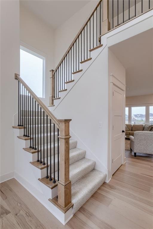 stairway with wood-type flooring