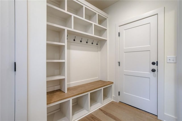 mudroom with light hardwood / wood-style floors