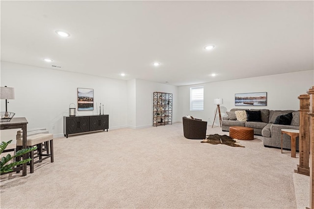 1602 NW 104th Ter, Kansas City, MO 64155 - living room featuring light colored carpet, baseboards, and recessed lighting