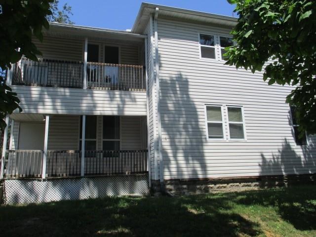 exterior space featuring a balcony