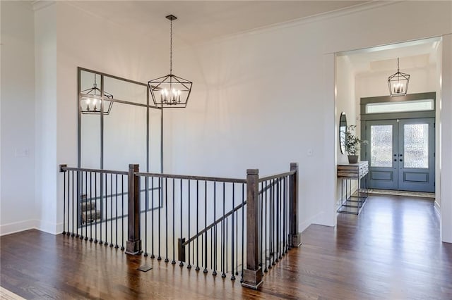 12300 S Hastings St, Olathe, KS 66061 - entrance foyer featuring a chandelier, wood finished floors, baseboards, french doors, and crown molding