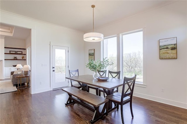 12300 S Hastings St, Olathe, KS 66061 - dining space featuring ornamental molding, plenty of natural light, and dark wood-style flooring