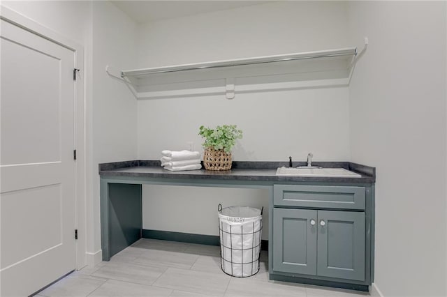 12300 S Hastings St, Olathe, KS 66061 - laundry area with a sink and baseboards