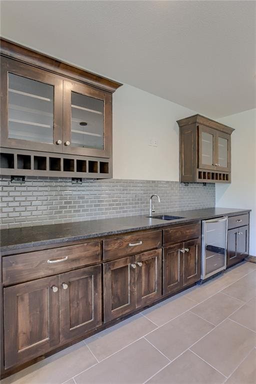 12300 S Hastings St, Olathe, KS 66061 - bar area with beverage cooler, decorative backsplash, and light tile patterned flooring