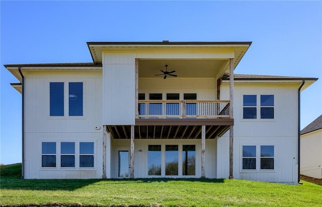 12300 S Hastings St, Olathe, KS 66061 - rear view of house featuring a balcony, a lawn, and ceiling fan