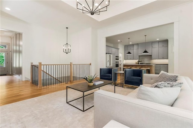 12484 S Barth Rd, Olathe, KS 66061 - living area featuring a chandelier, light wood-style flooring, and recessed lighting