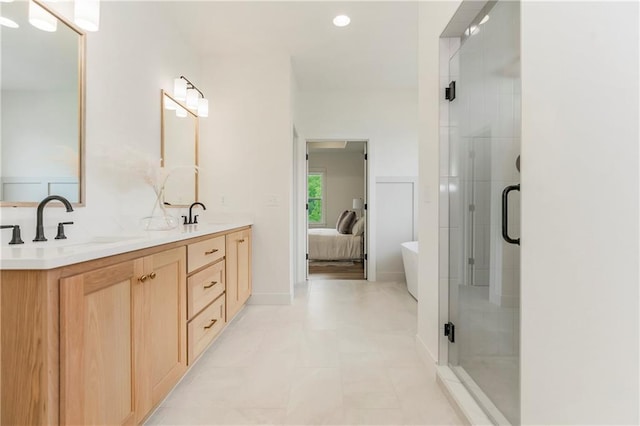 12484 S Barth Rd, Olathe, KS 66061 - ensuite bathroom featuring double vanity, a stall shower, and a freestanding bath