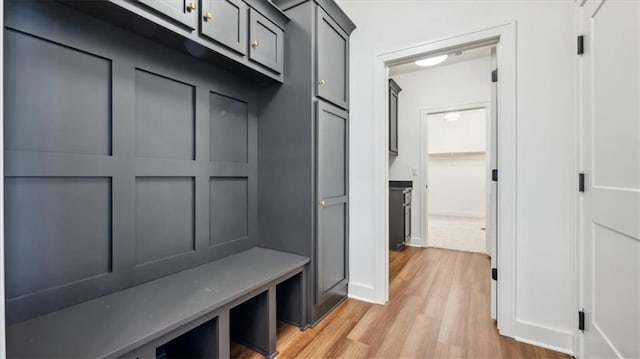 mudroom with light hardwood / wood-style flooring