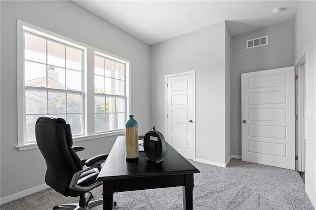 home office featuring light carpet