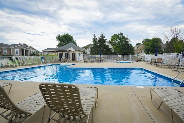 view of pool featuring a patio area