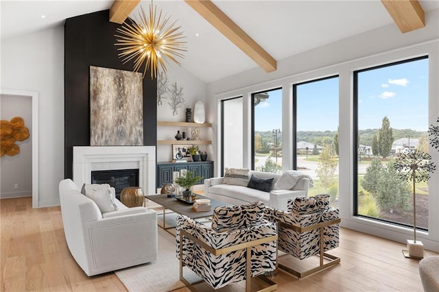 living room featuring beamed ceiling, high vaulted ceiling, a chandelier, and light hardwood / wood-style floors