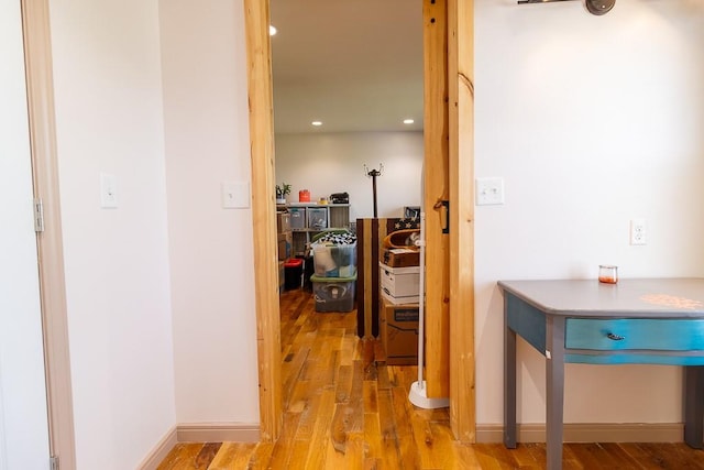 hall with light wood-type flooring