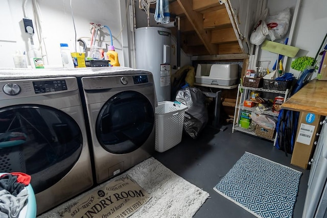 washroom with washer and dryer and electric water heater