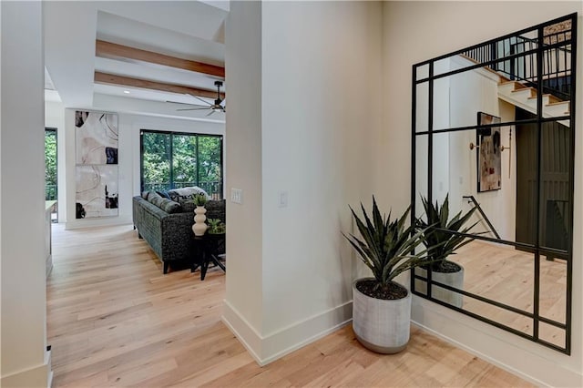 2207 W 71st St, Prairie Village, KS 66208 - corridor featuring wood finished floors, baseboards, and stairway