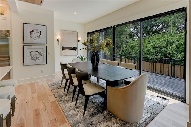 2207 W 71st St, Prairie Village, KS 66208 - dining space with baseboards, light wood finished floors, and recessed lighting