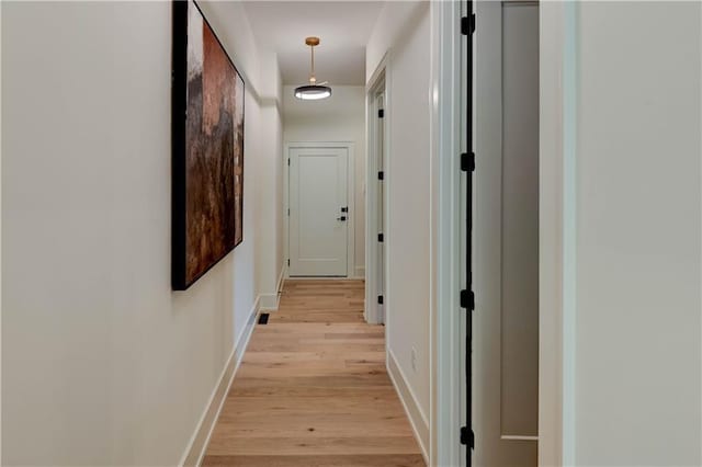 2207 W 71st St, Prairie Village, KS 66208 - hall with light wood-type flooring and baseboards