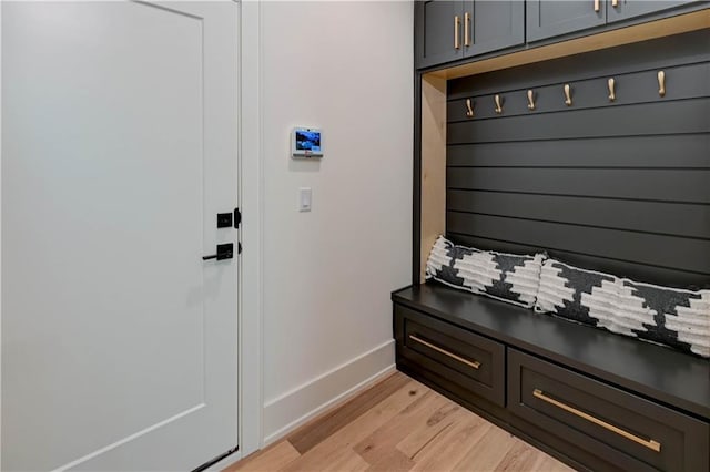 2207 W 71st St, Prairie Village, KS 66208 - mudroom featuring baseboards and light wood-style flooring