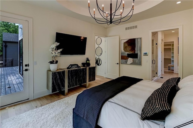 2207 W 71st St, Prairie Village, KS 66208 - bedroom with light wood-style flooring, a chandelier, access to outside, recessed lighting, and baseboards