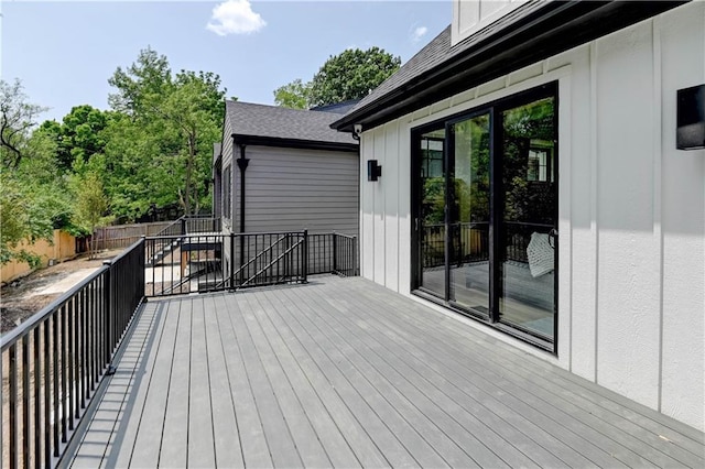 2207 W 71st St, Prairie Village, KS 66208 - wooden deck featuring a fenced backyard