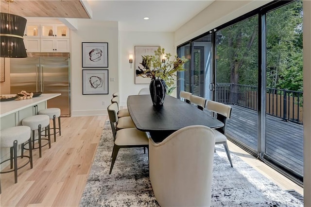 2207 W 71st St, Prairie Village, KS 66208 - dining space with light wood-type flooring, baseboards, and recessed lighting