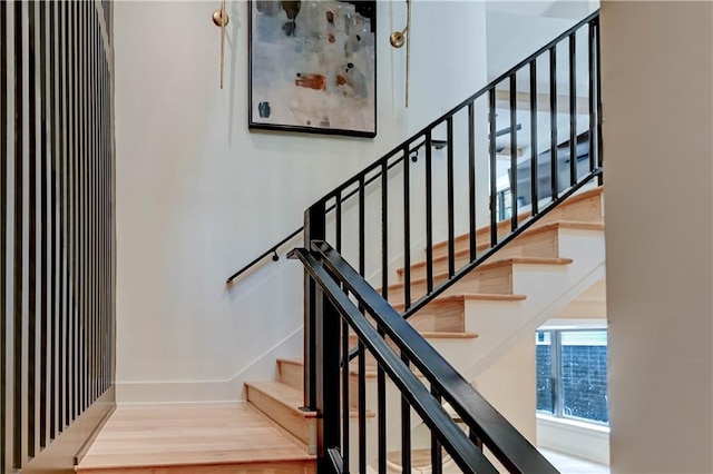 2207 W 71st St, Prairie Village, KS 66208 - stairs with baseboards and wood finished floors